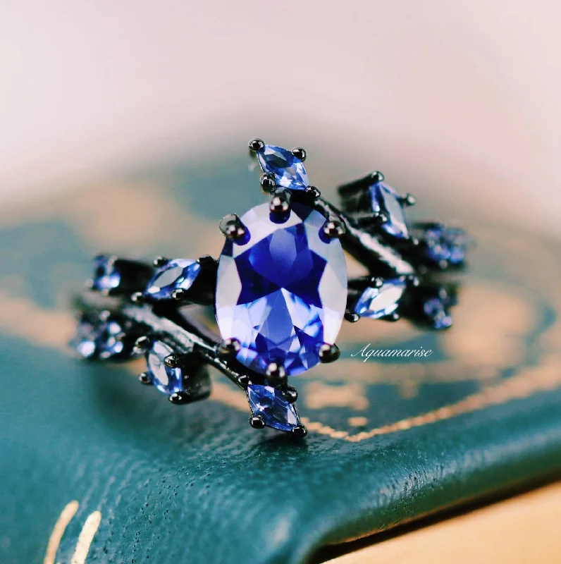 Diverse gem ring-Cornflower Blue Sapphire Leaf Engagement Ring- Black Rhodium Filled