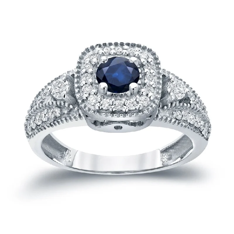 Dusk-cut ring-Three Stone 1/5ct Blue Sapphire and 2/5ct TDW Diamond Halo Engagement Ring in 14k Gold by Auriya