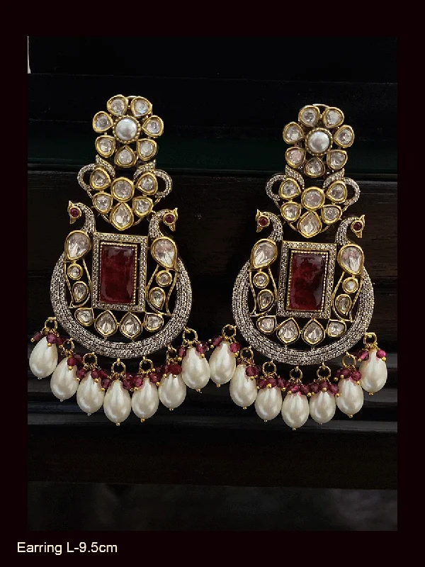 Raised stone earrings-Antique finish AD and kundan peacock design rectangular stones long earrings with pearl drops