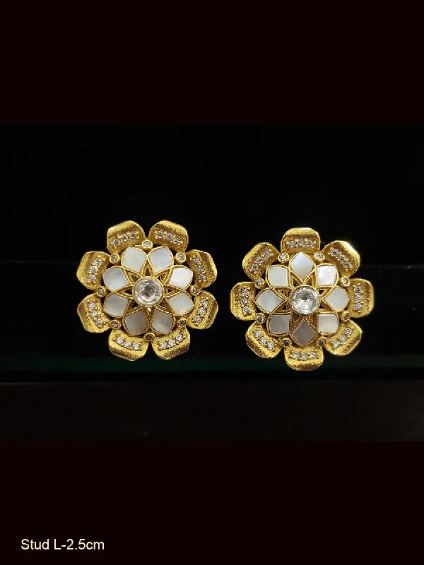 Bold emerald earrings-Flower design stone studded with kundan and AD studs