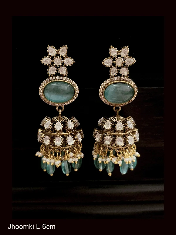 Rich howlite earrings-Flower top oval stone with zircon outline kundan jhoomki with coloured drops